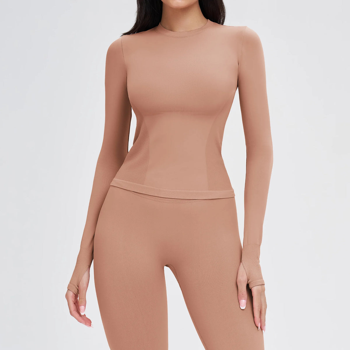 חולצת אימון צמודה עם שרוולים ארוכים ופתחי אגודל – ורוד עתיק